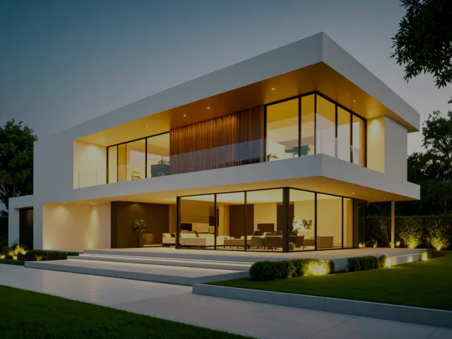Maison d'architecte moderne illuminée en soirée